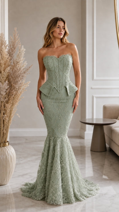 Front view of model wearing sage green strapless lace corset mermaid evening gown