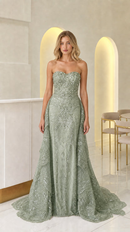 Front view of sage green strapless beaded formal gown with train