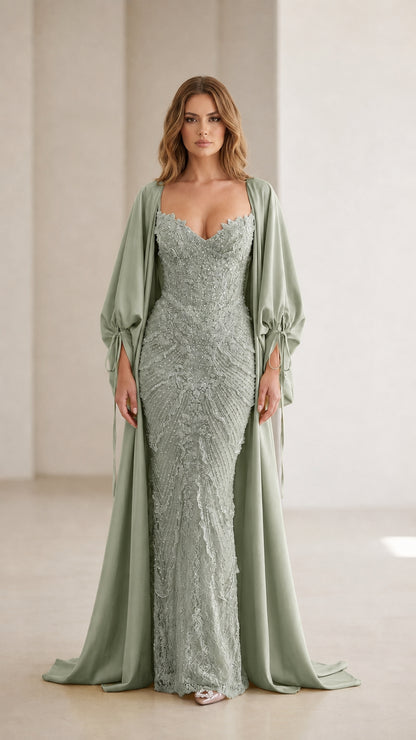 Front view of sage green color variant of the evening gown and cape