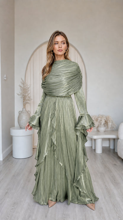 Front view of model wearing metallic sage green pleated long sleeve maxi dress