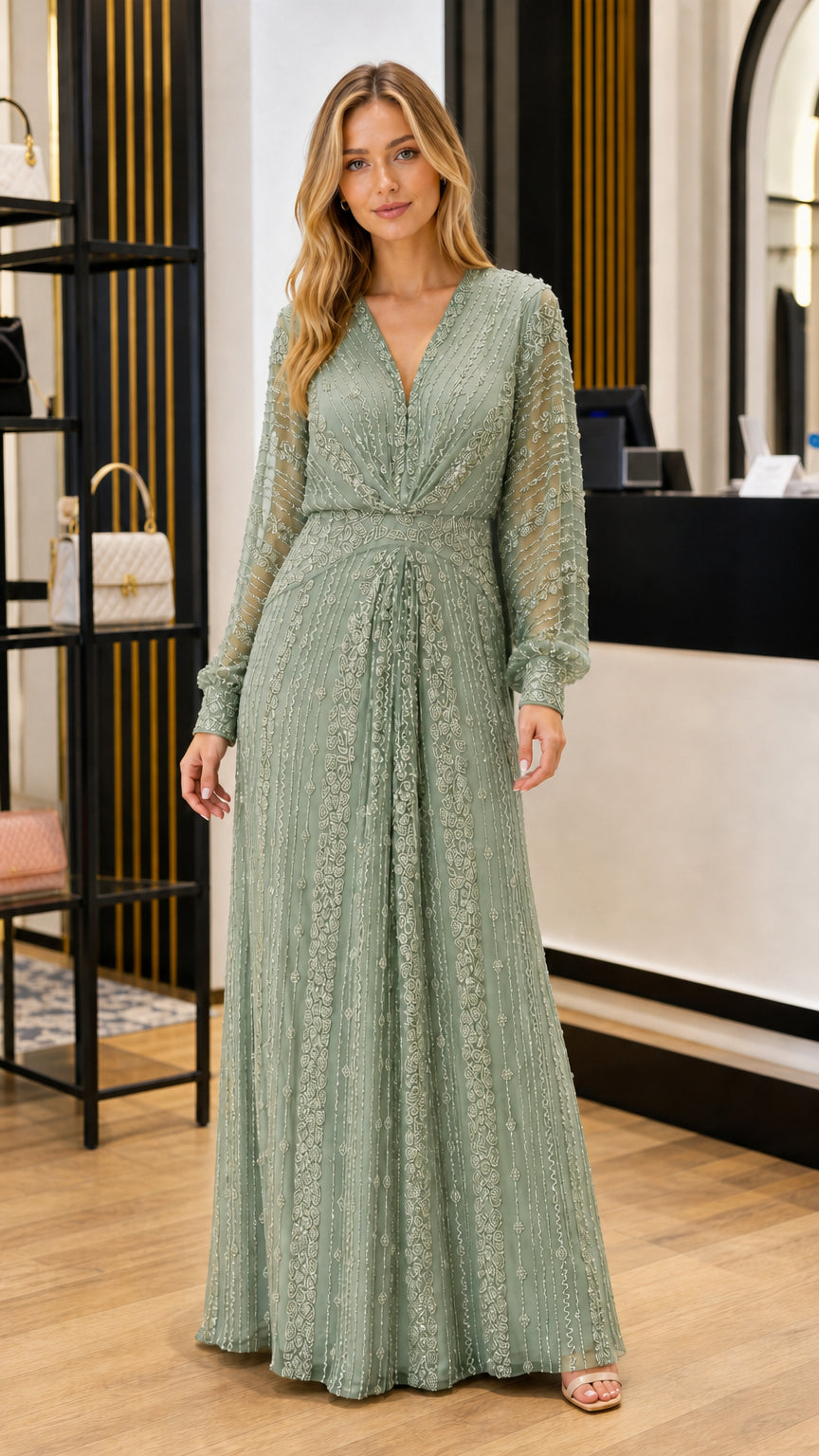 Full front view of sage green beaded long sleeve evening gown