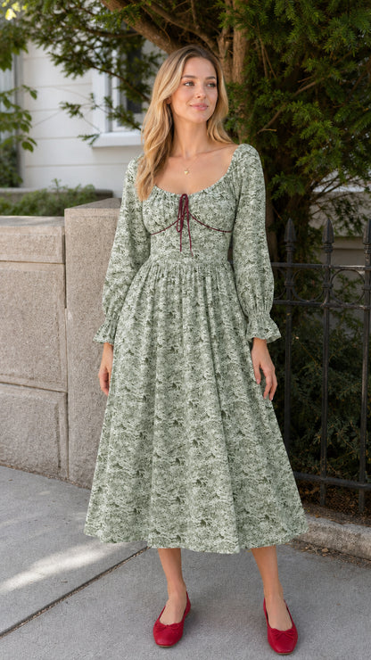 Model wearing green vintage toile print midi dress