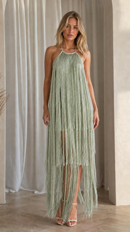 Front view of model wearing sage green fringe maxi dress