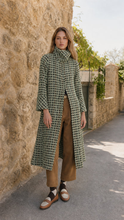 Model wearing sage green textured tweed stand collar longline coat