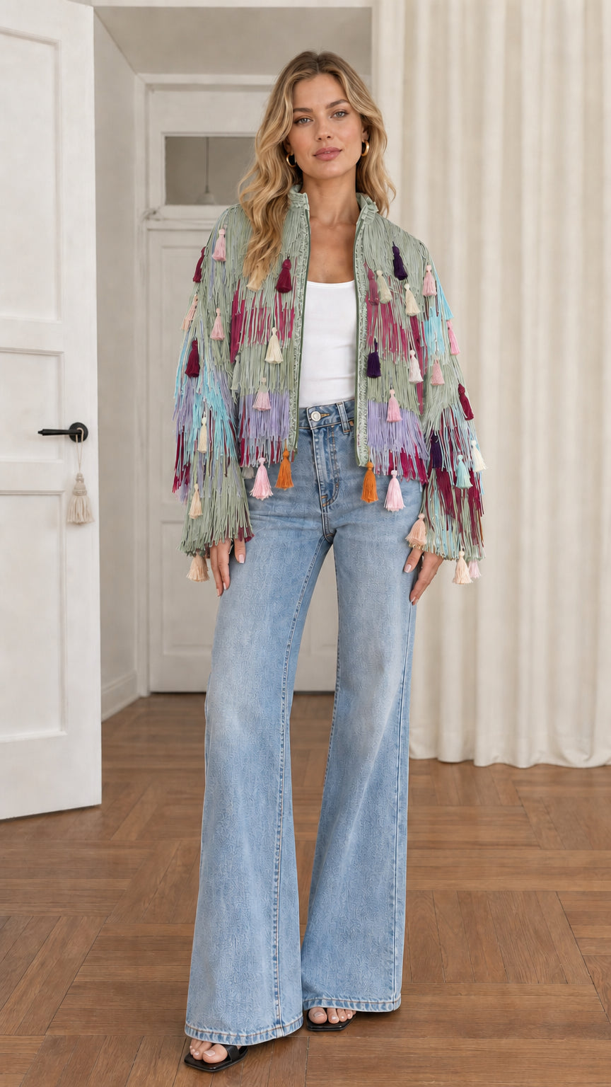 Full-length shot of model wearing sage green multi fringe tassel jacket