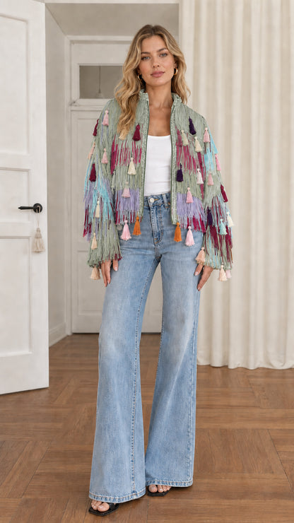 Full-length shot of model wearing sage green multi fringe tassel jacket