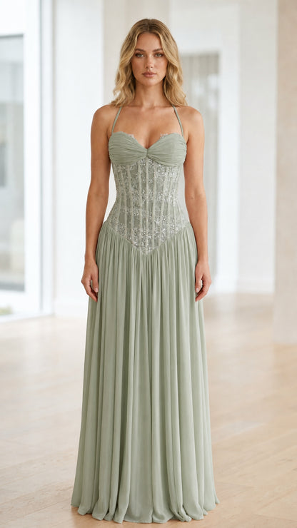 Front view of sage green halter neck sequin corset long dress