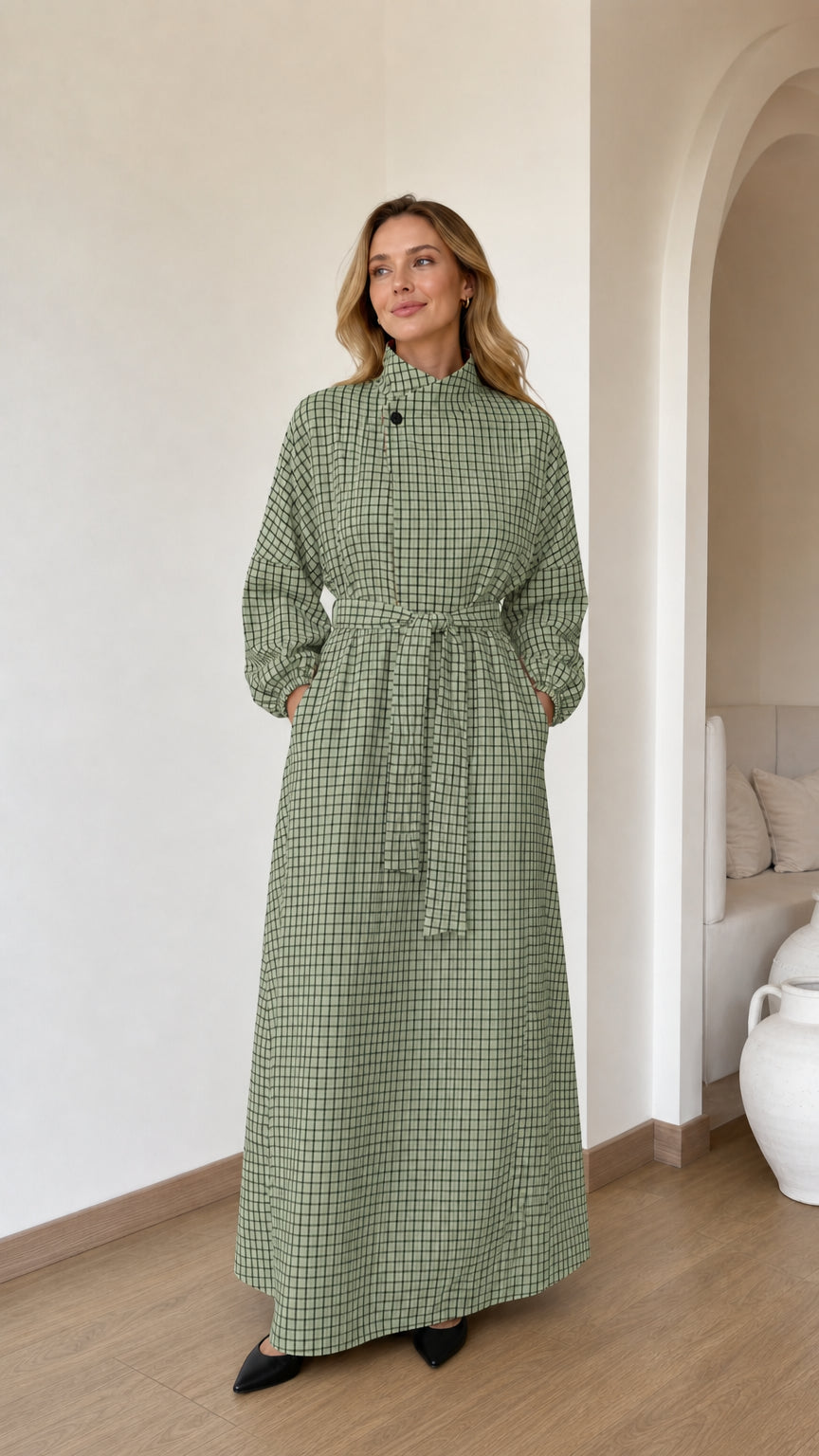 Front view of woman wearing Sage Green grid check high neck maxi dress