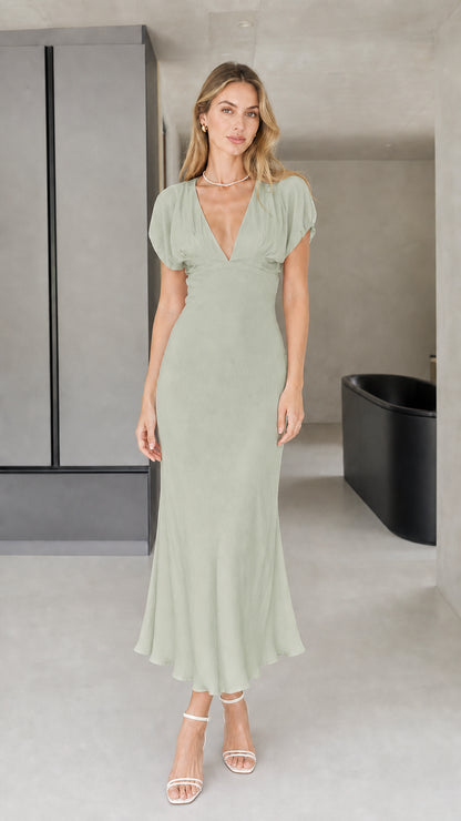 Front view of model wearing sage green midi dress