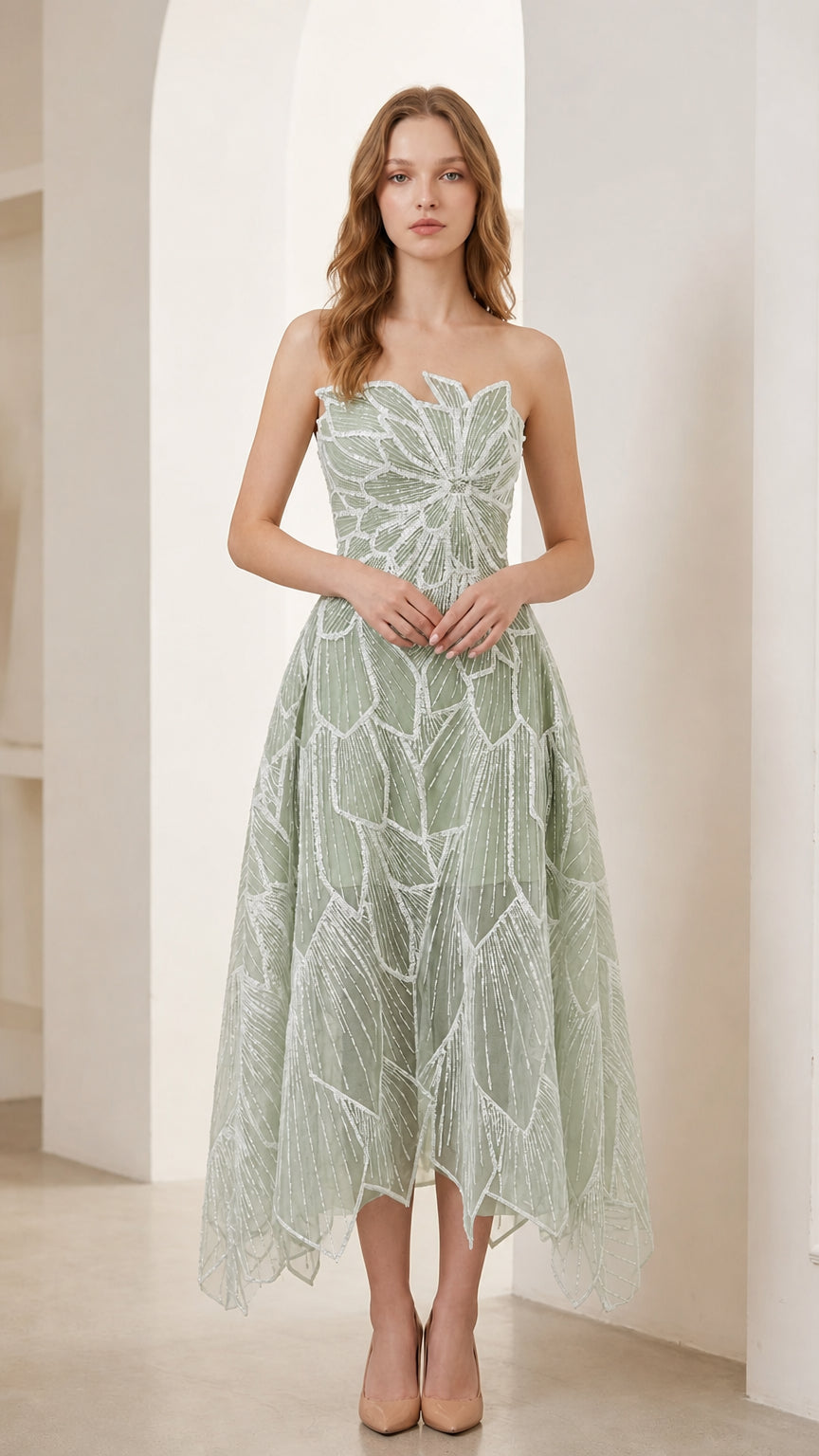 Woman wearing sage green strapless beaded leaf embroidery midi cocktail dress