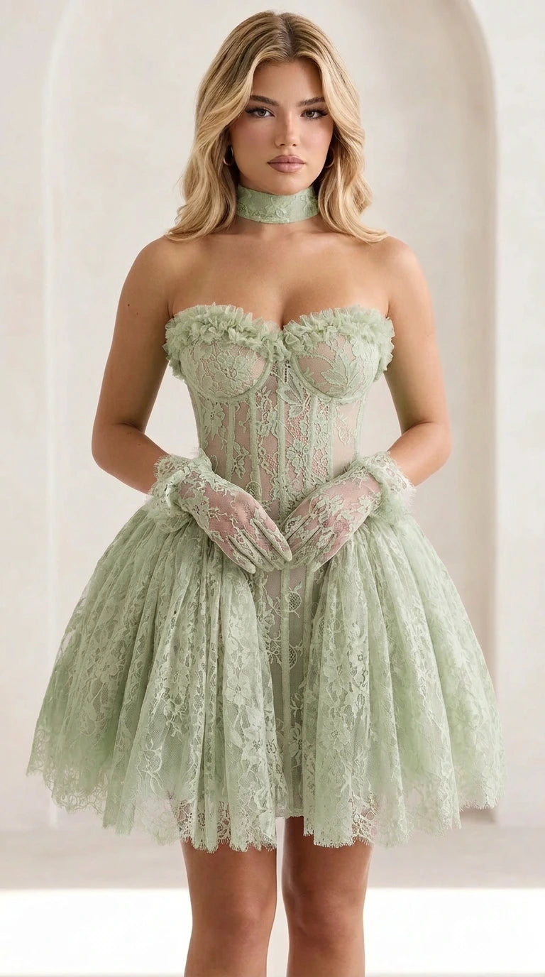 Front view of model wearing sage green lace corset mini dress