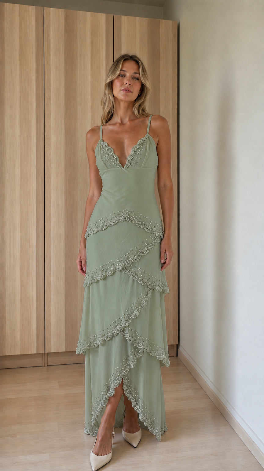 Front view of sage green tiered beaded maxi dress