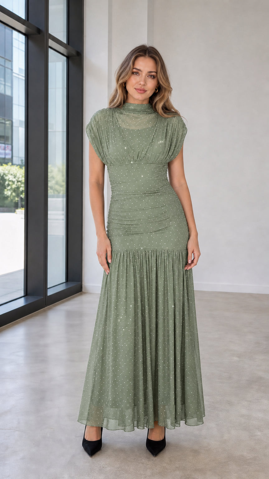 Model wearing sage green glitter mesh maxi dress