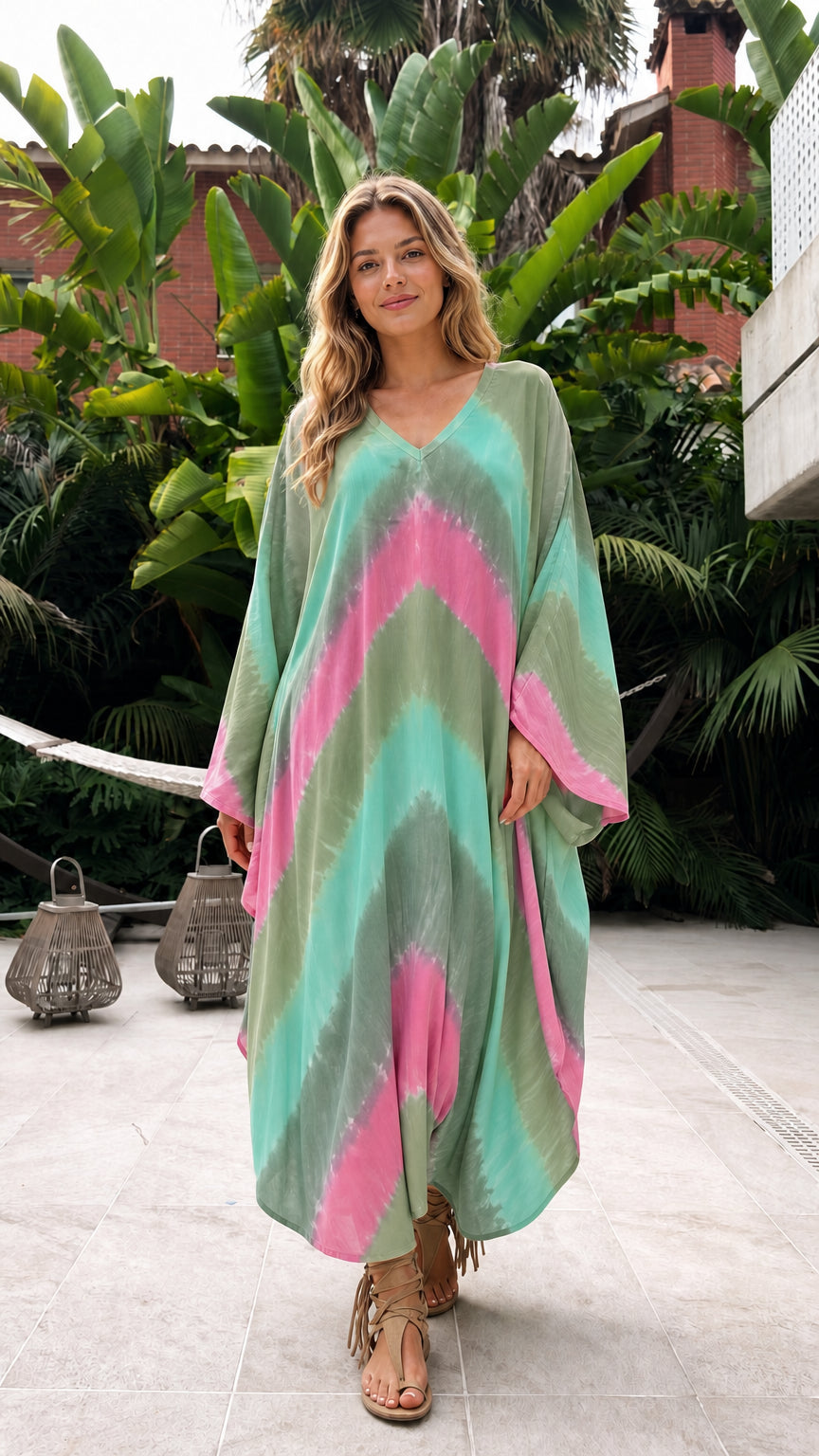 Model wearing sage green multi tie-dye kaftan dress