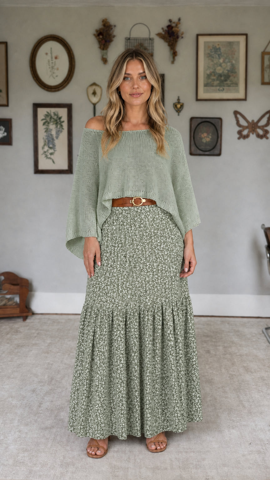 Model wearing sage off-the-shoulder knit top and sage floral maxi skirt set