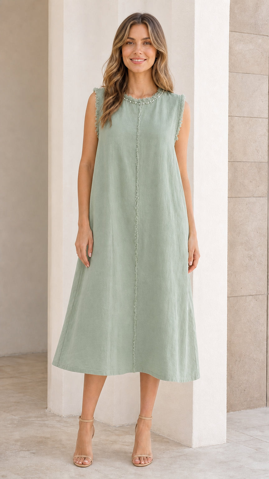Front view of woman wearing sage green sleeveless midi dress