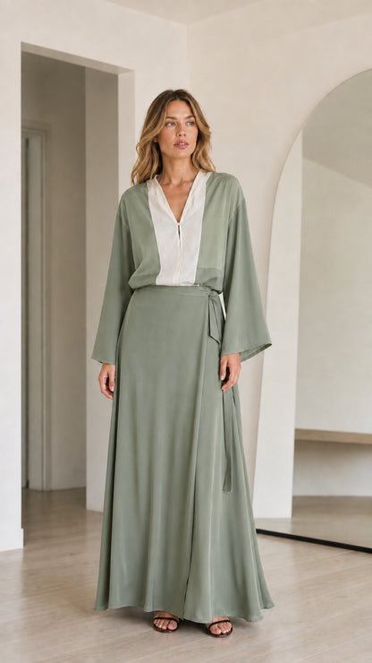 Model wearing Sage Green and white contrast long sleeve maxi dress