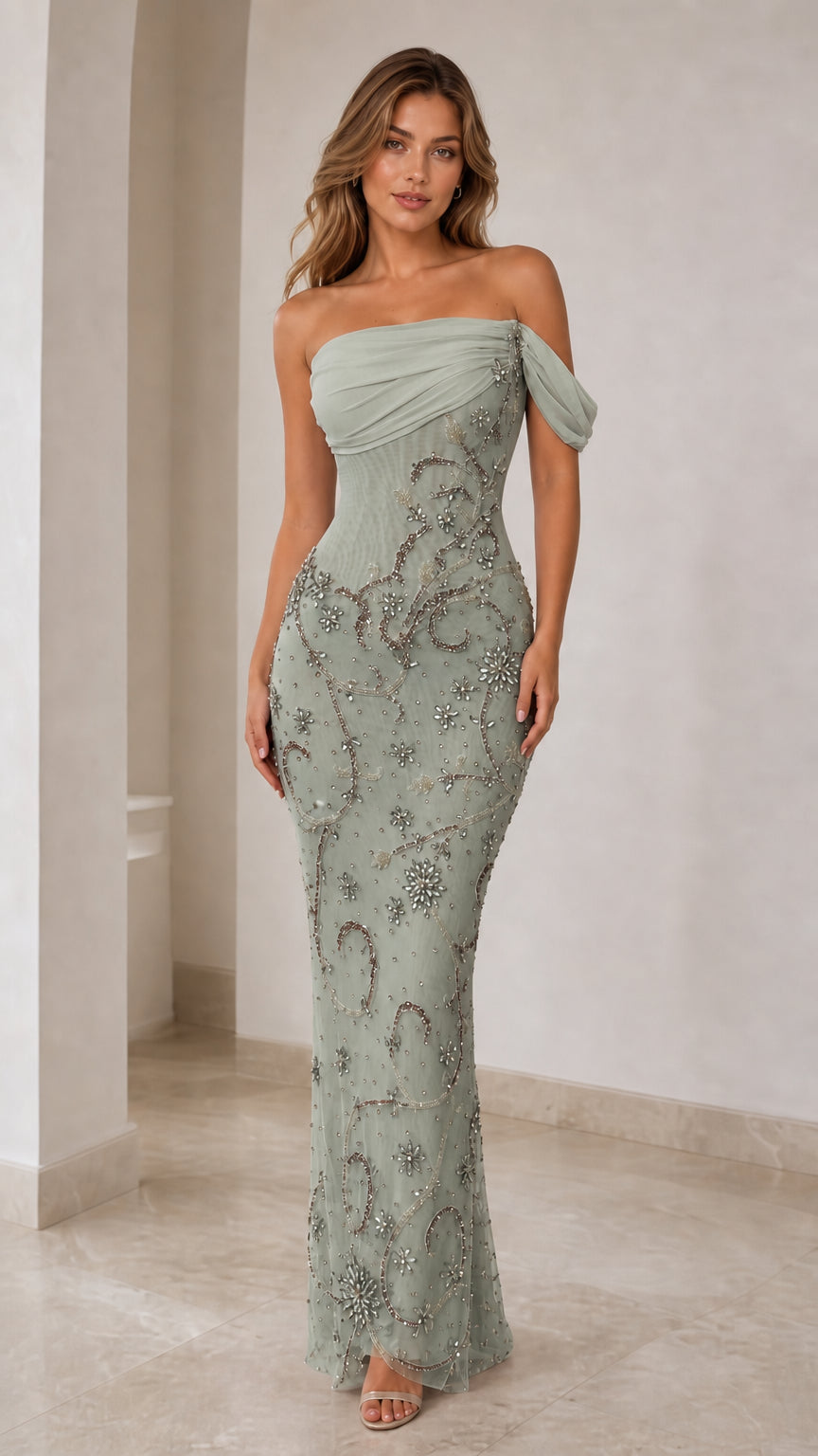 Front view of sage green beaded evening gown