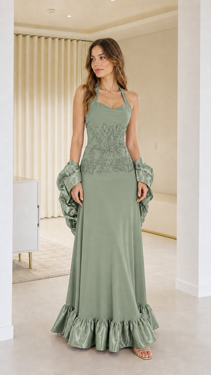 Front view of woman wearing green halter neck evening dress