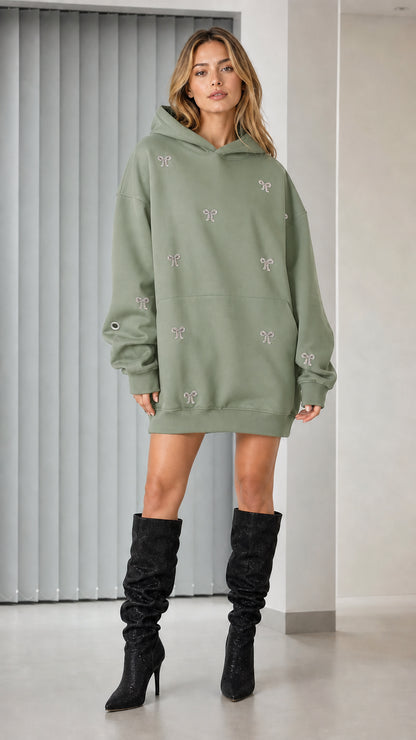 Full-length view of sage green rhinestone bow oversized hoodie dress