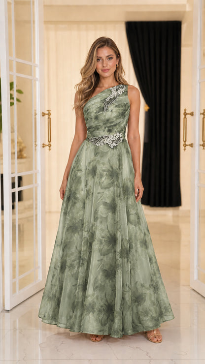 Front view of model in sage green floral evening gown