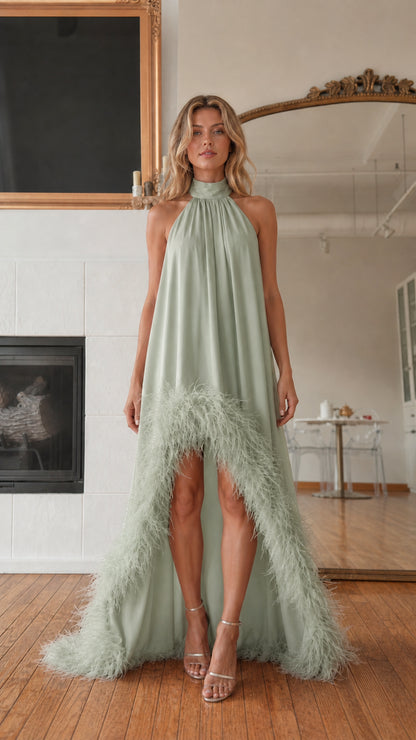 Front view of model wearing sage green feather hem high neck maxi dress