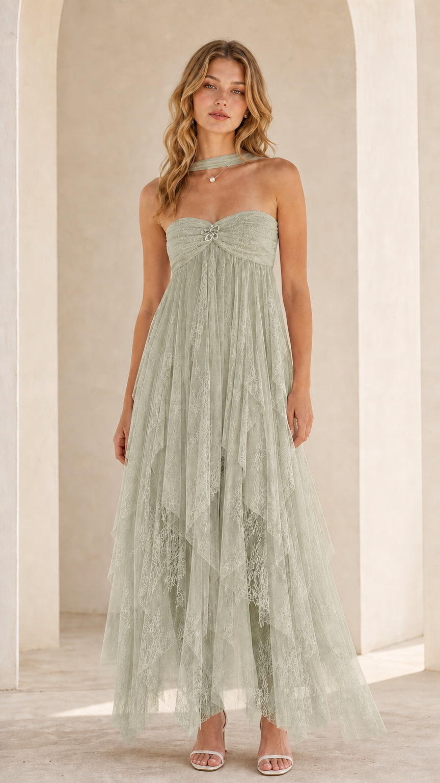 Model wearing sage green strapless tulle maxi dress