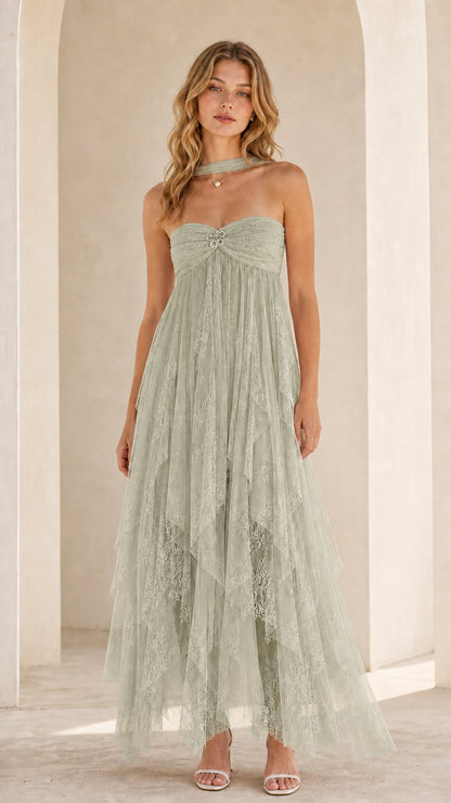Model wearing sage green strapless tulle maxi dress