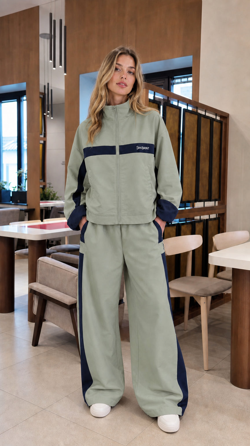 Sage green colorblock zip-up jacket and wide-leg tracksuit set on model