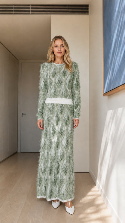 Model wearing sage green textured knit maxi dress