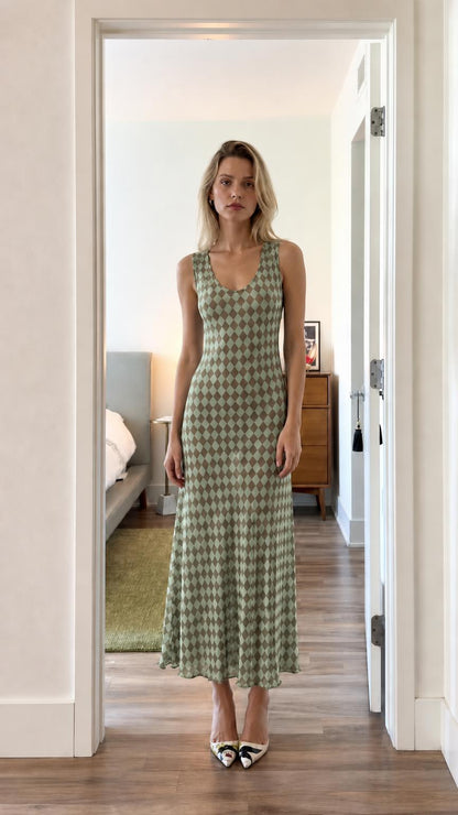 Front view of model wearing green argyle dress