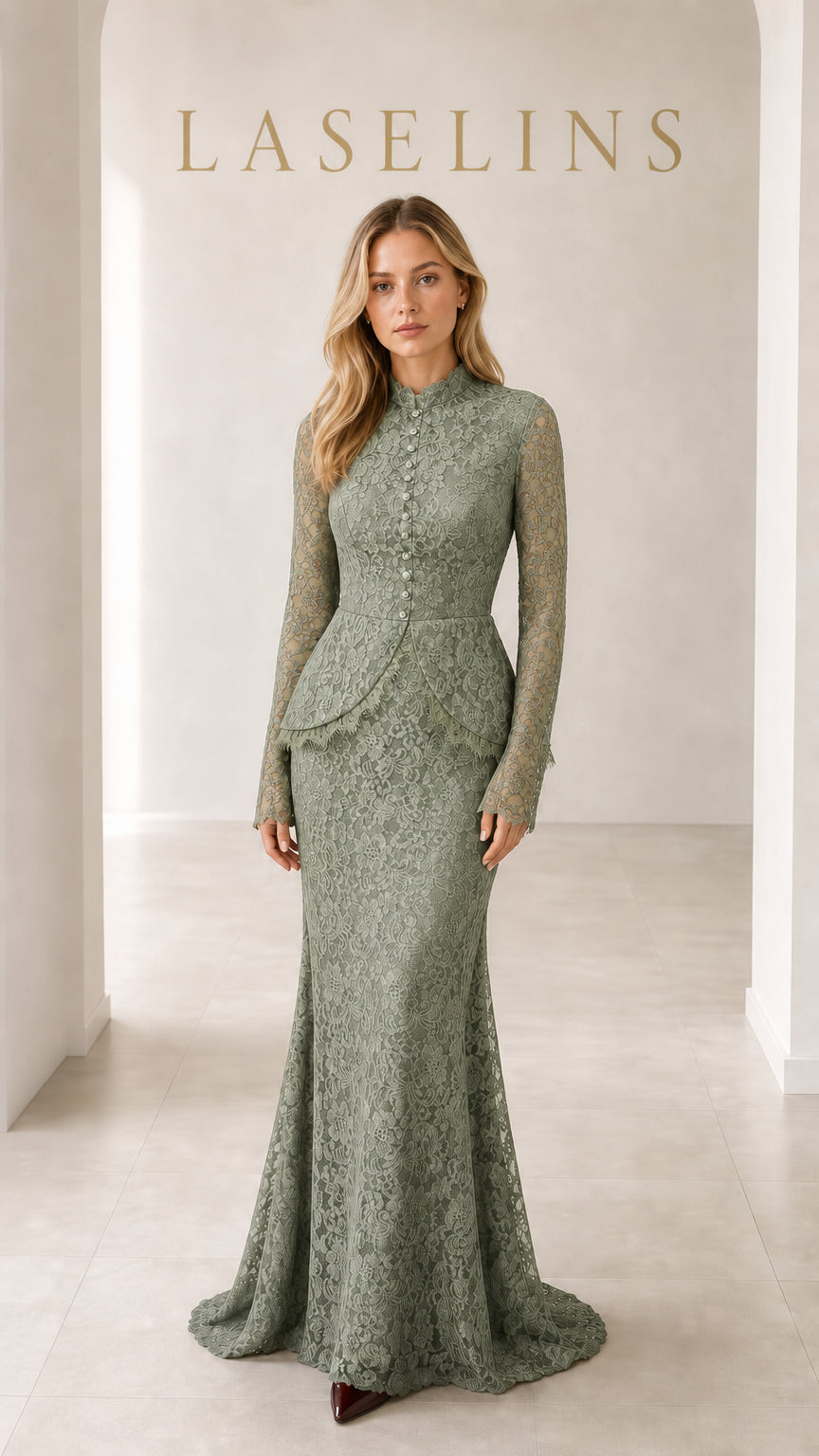 Model wearing sage green mock neck lace mermaid evening gown
