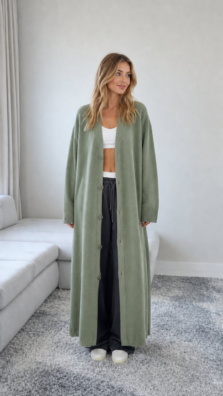 Front view of model wearing a Sage Green floor length maxi duster cardigan