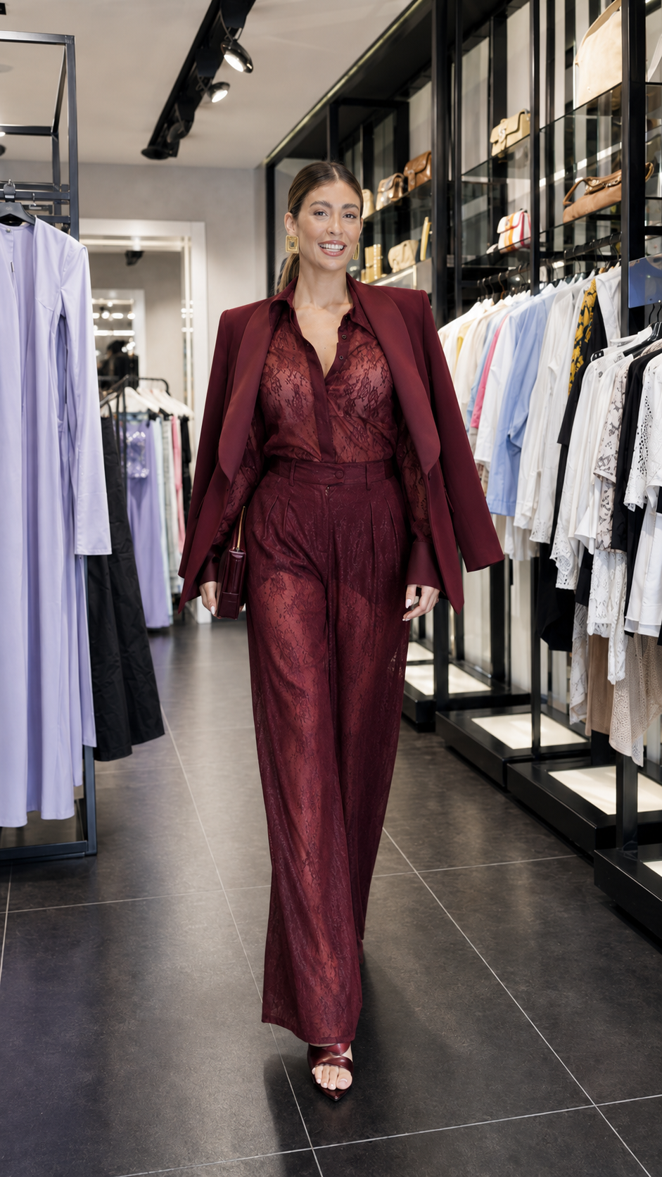Model wearing burgundy 3-piece lace blazer and wide-leg pants set