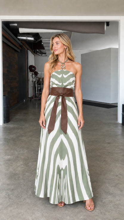 Front full view of green zebra striped halter maxi dress