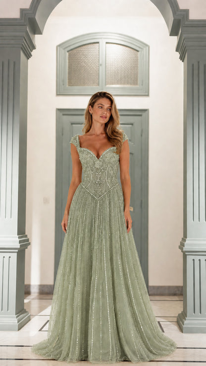 Front view of sage green beaded formal gown