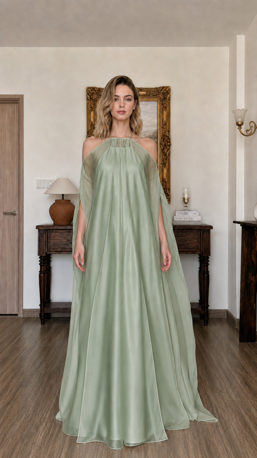 Model wearing sage green draped maxi dress