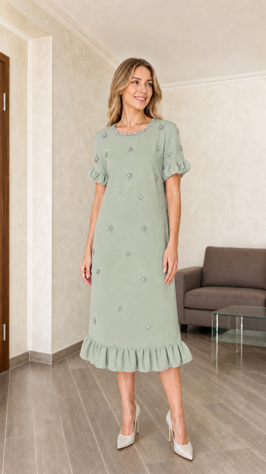 Model wearing sage green embellished midi dress