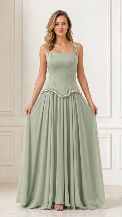 Full front view of a woman wearing a sage green square neck evening maxi dress