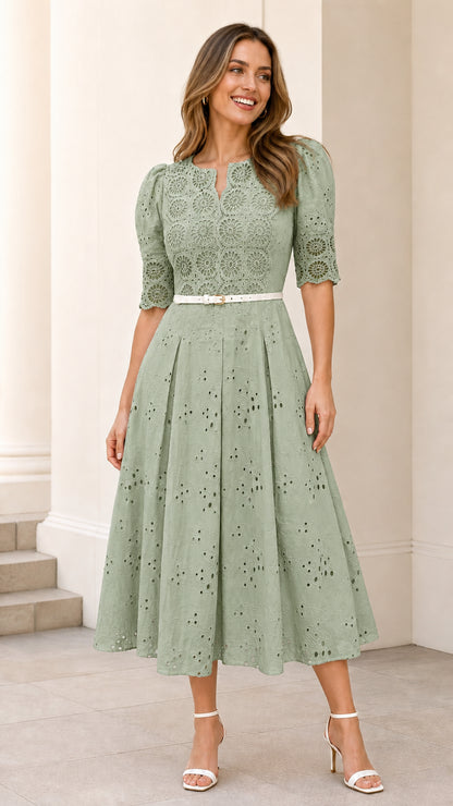 Front full view of sage green eyelet midi dress