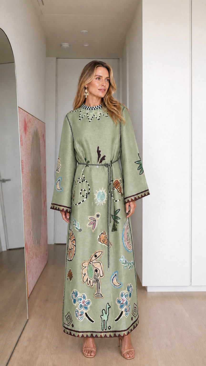 Model wearing sage green boho printed long sleeve maxi dress
