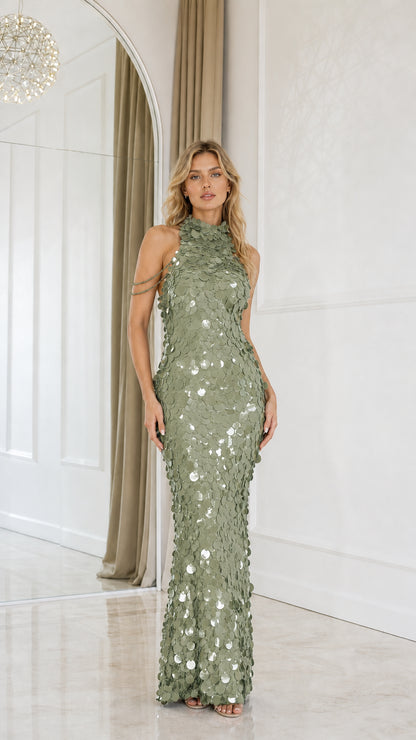 Model wearing Sage Green sequin halter neck evening gown
