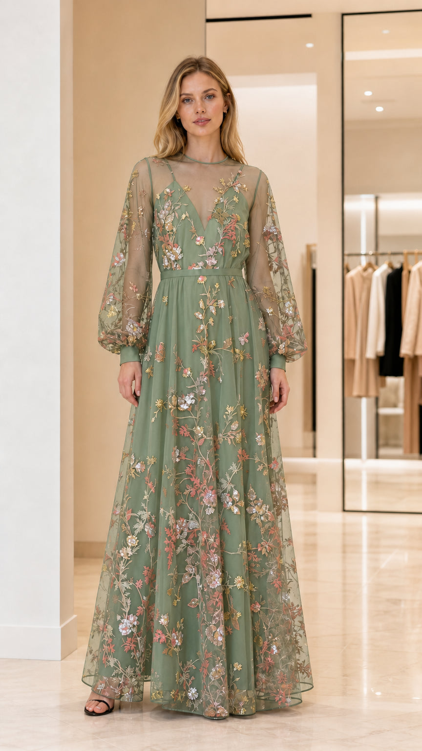 Front view of woman wearing sage green embroidered maxi dress
