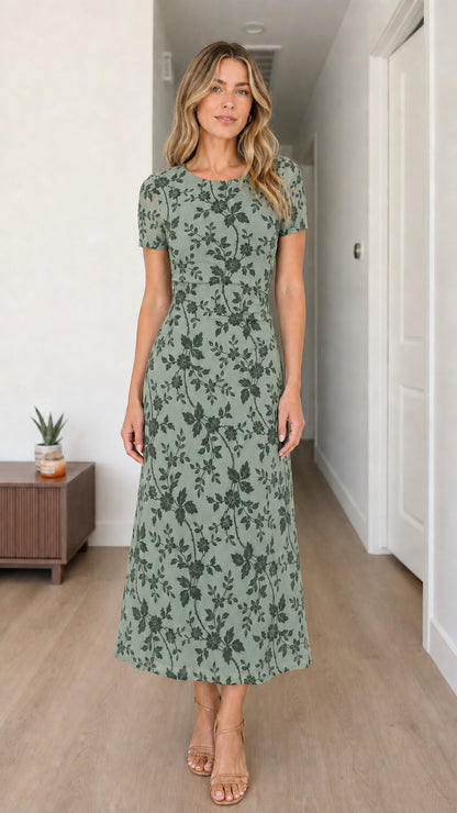 Woman wearing sage green floral midi dress