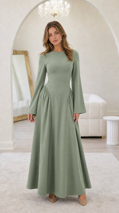 Front view of model wearing sage green long-sleeve maxi dress