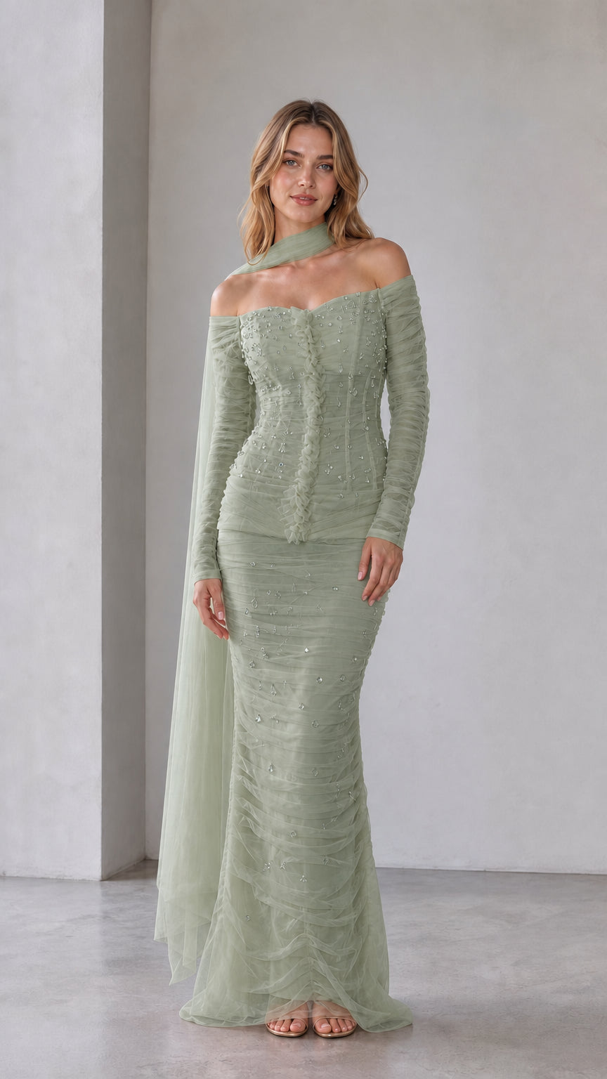 Sage green embellished off-shoulder mermaid maxi dress with flowing overlay