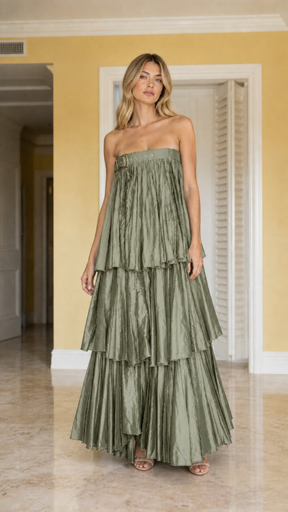 Front view of model wearing sage green strapless tiered pleated maxi dress