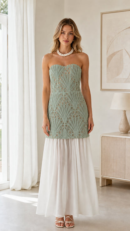 Front view of sage green embroidered bodice with white skirt strapless maxi dress