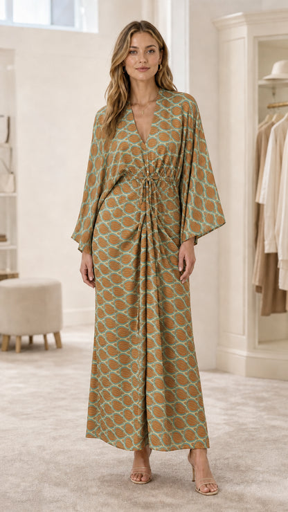 Model wearing sage green geometric print maxi dress