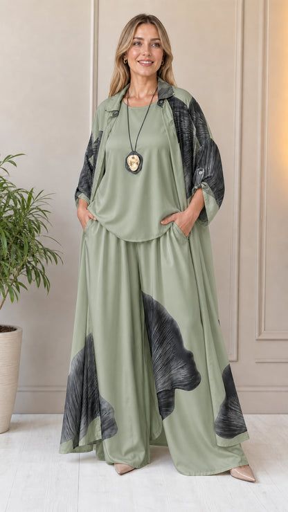 Woman wearing sage green abstract print 3-piece set